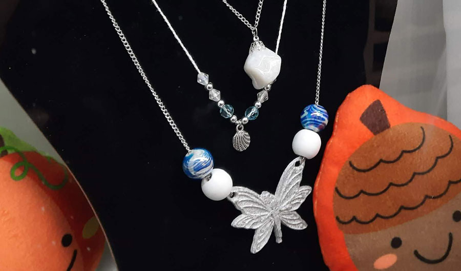 oquirrh mountain fairy necklace on display